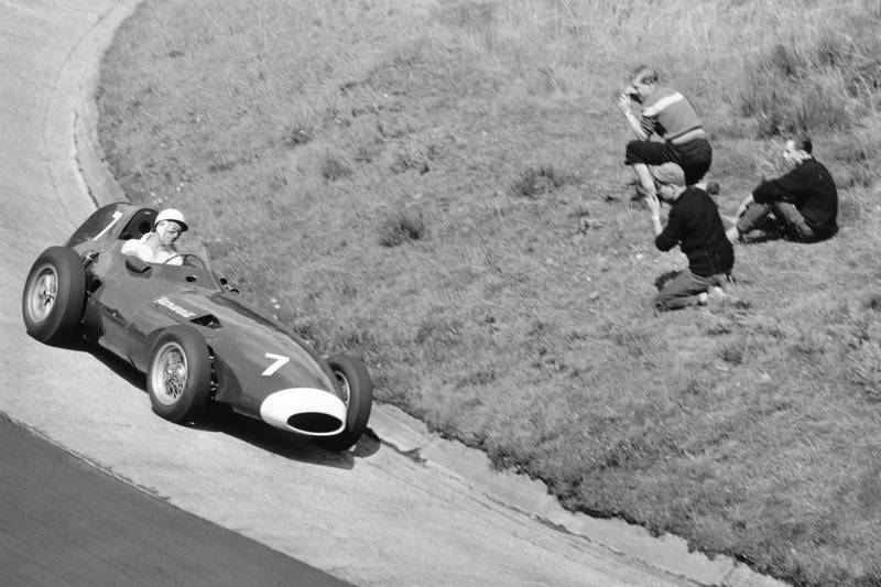 Stirling Moss takes his Vanwall around the Karussel.