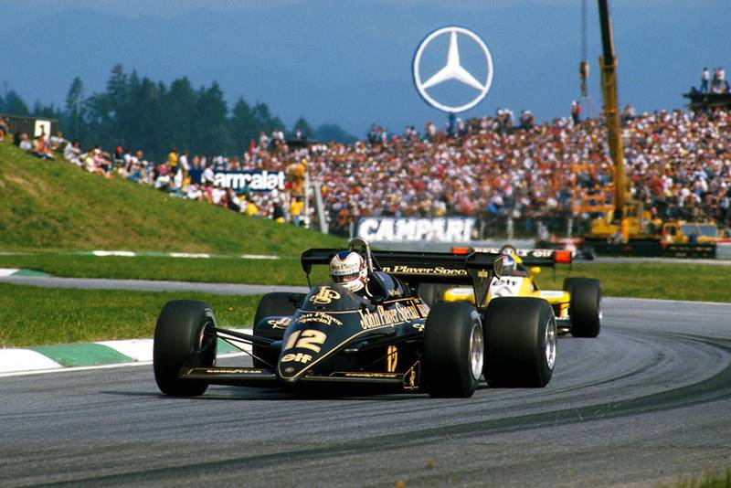 Ayrton Senna's Toleman, leading Elio de Angelis in his Lotus.