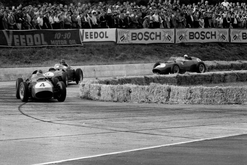 Tony Brooks in a Ferrari Dino 246 leads into the Hairpin.