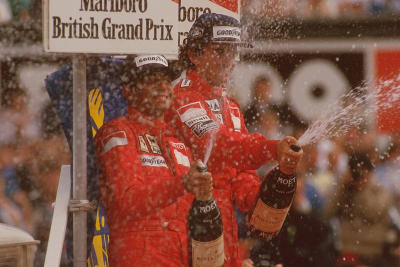 Alain Prost, 1st position, and Michele Alboreto, 2nd position on the podium.