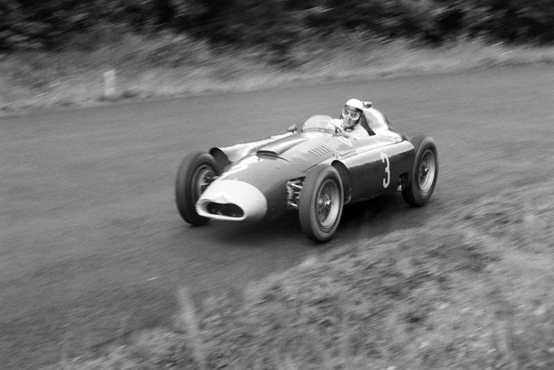 Eugenio Castellotti in his slightly battered Ferrari/Lancia D50 during the 1956 German Grand Pix, Nurburgring.