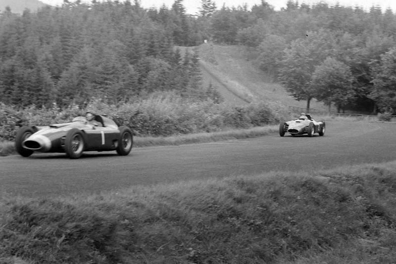 Juan Manuel Fangio, Ferrari D50, leads Peter Collins, Ferrari D50 at the 1956 German Grand Prix, Nurburgring.
