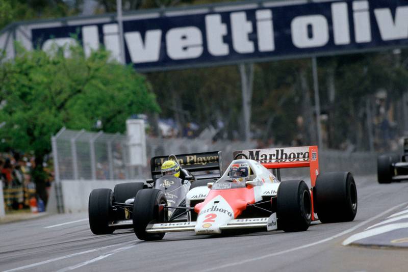 Keke Rosberg (McLaren MP4/2 TAG Porsche) leads Ayrton Senna (Lotus Renault).