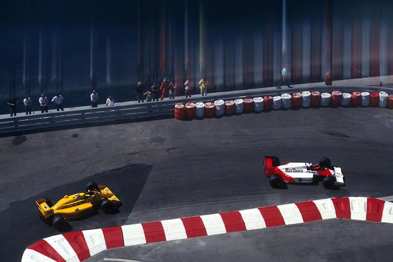 Alain Prost (Mclaren MP4/3) leads race winner Ayrton Senna (Lotus 99t).