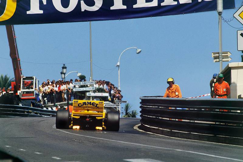 Lotus 99T Honda charges up hill.