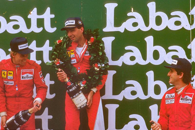 Michele Alboreto, 1st position, Stefan Johansson, 2nd position and Alain Prost, 3rd position, on the podium.