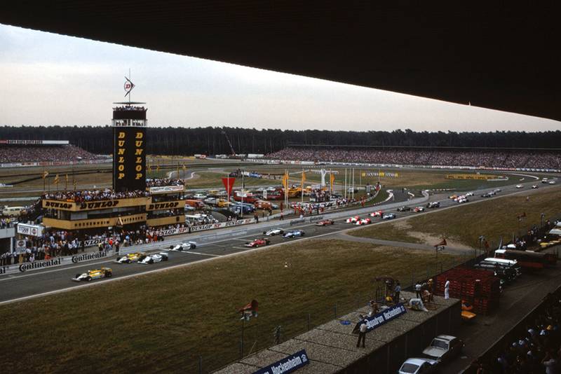 Alain Prost (Renault RE30) makes a clean getaway on the left side of the track at the start of the race.