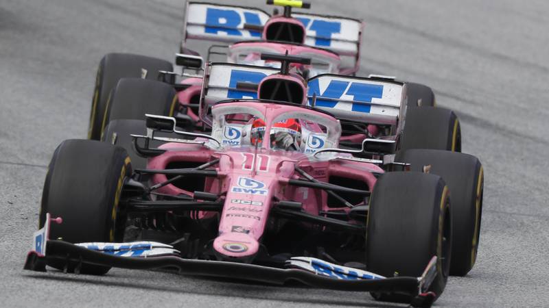 Sergio Perez with a damaged front wing ahad of Lance Stroll in the 2020 f1 Styrian Grand Prix in Austria