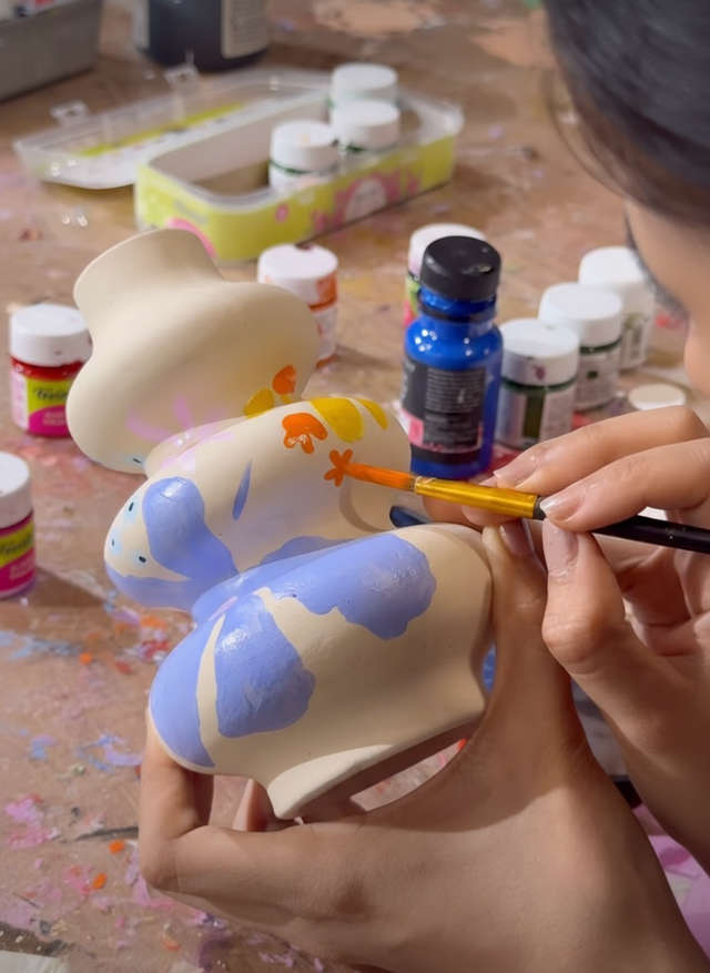 Try your hand at DIY ceramic painting at this cozy cafe