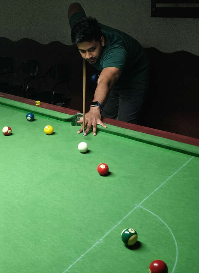 Grab a cue and play snooker or billiards at Q ball city